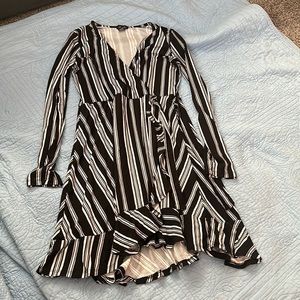 this dress is from justify is medium and black and white